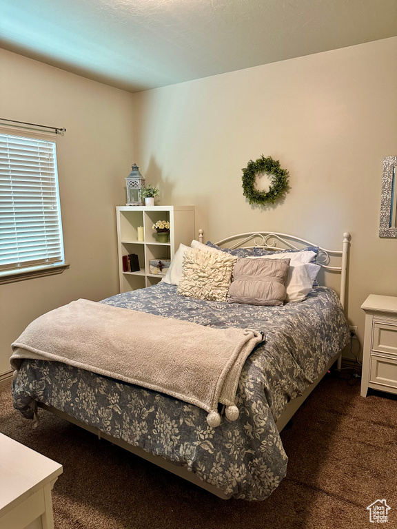 Bedroom with carpet flooring
