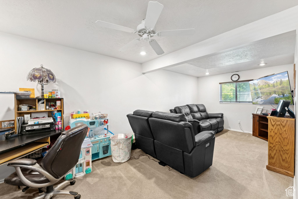 Office featuring carpet flooring, recessed lighting, ceiling fan, and a textured ceiling