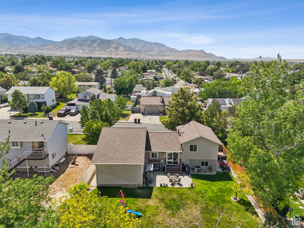 Aerial view of residential area with mountains