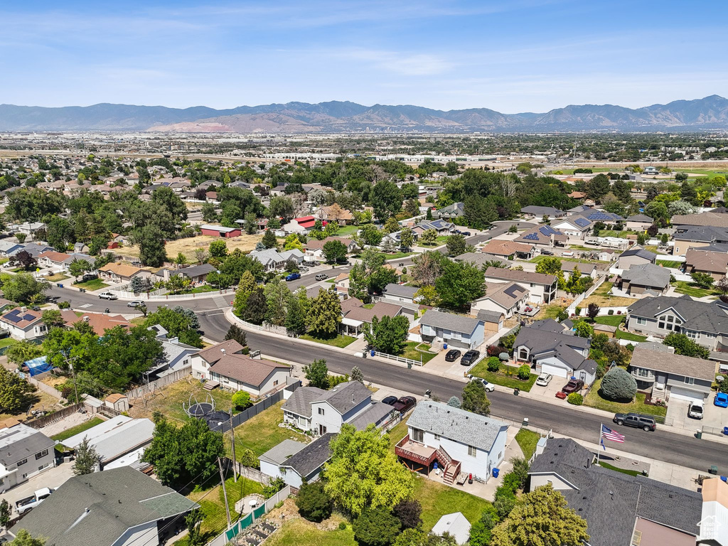 Aerial perspective of suburban area featuring mountains