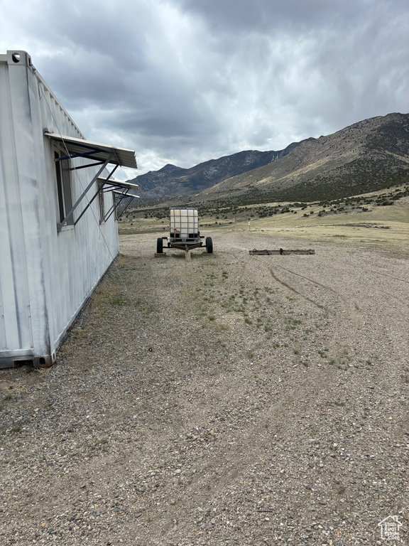 View of yard with a mountain view