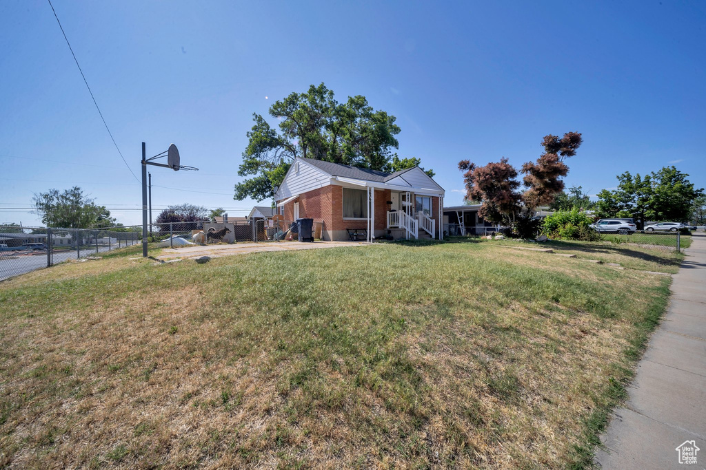 View of home's exterior featuring brick siding