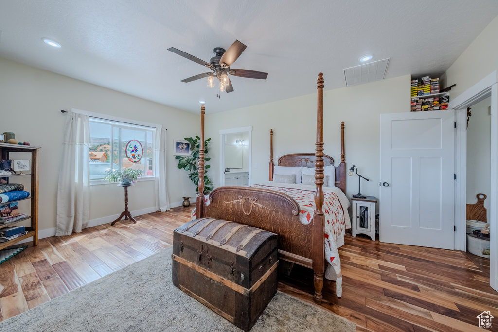 Bedroom featuring wood finished floors, recessed lighting, and ceiling fan