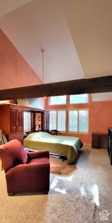 Game room featuring high vaulted ceiling and carpet flooring