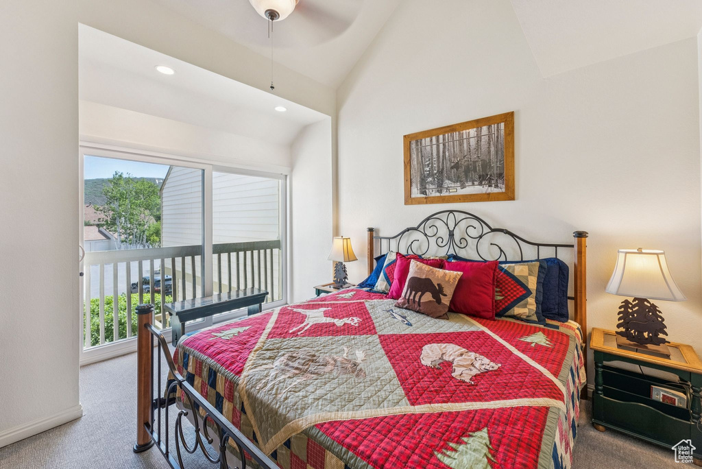 Carpeted bedroom with vaulted ceiling, multiple windows, access to outside, recessed lighting, and a ceiling fan