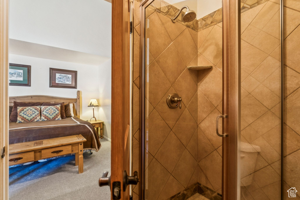 Ensuite bathroom with a stall shower