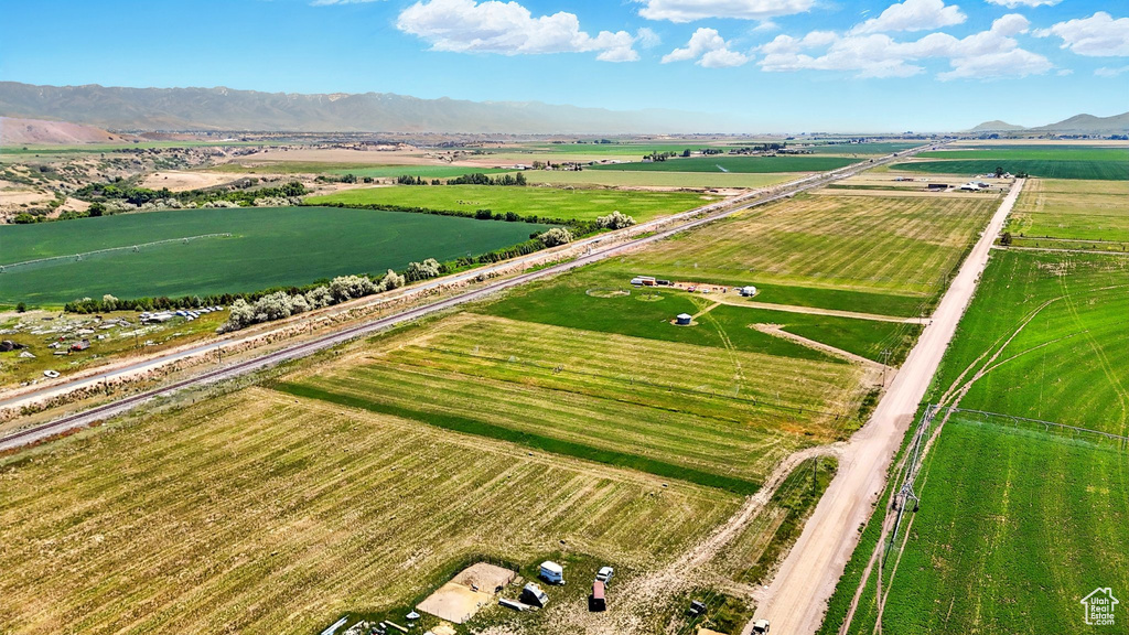 Overview of rural landscape with mountains and extensive farmland