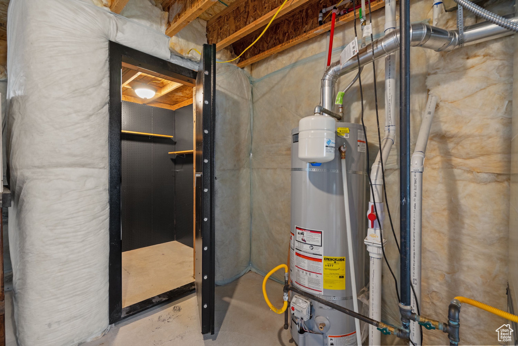Utility room with gas water heater