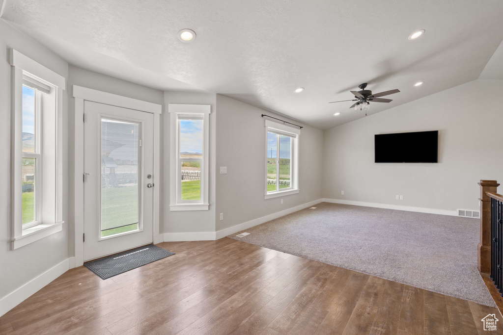 Entryway with wood finished floors, vaulted ceiling, recessed lighting, and a ceiling fan