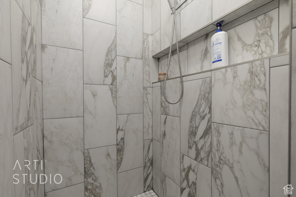 Bathroom view of a tile shower