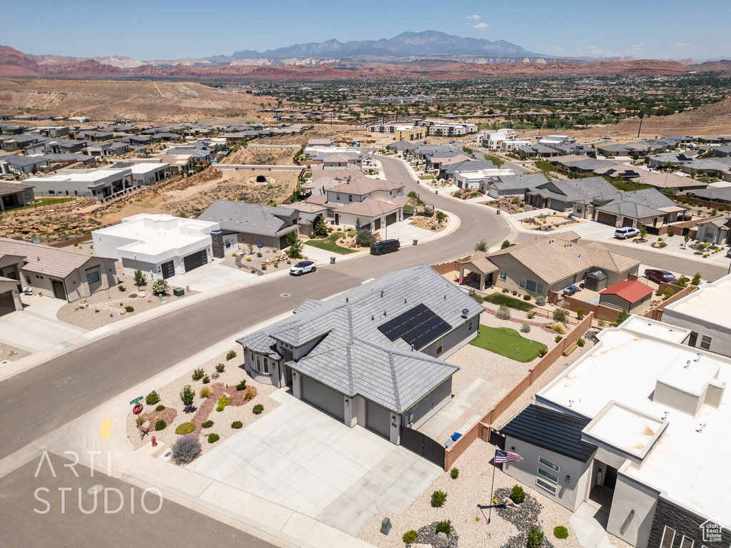 Aerial view of residential area with mountains