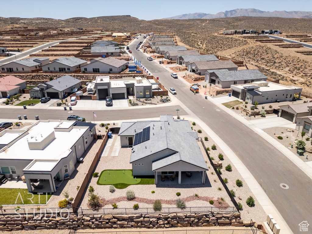 Aerial perspective of suburban area with mountains