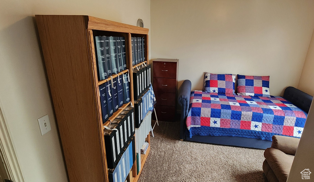 Bedroom featuring carpet flooring