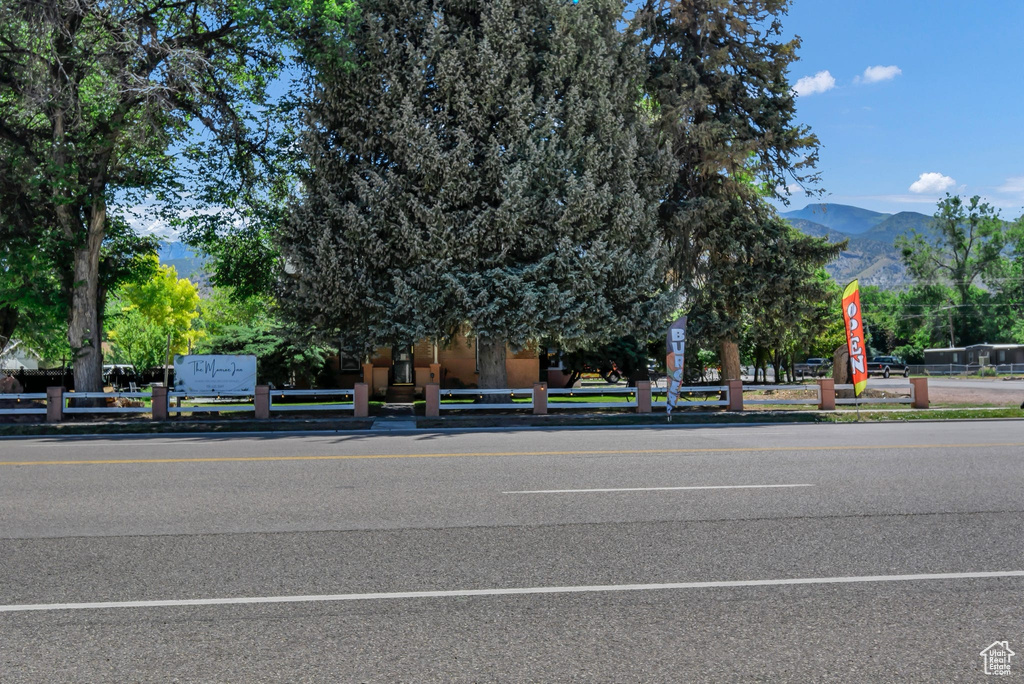 View of asphalt road with a mountain view