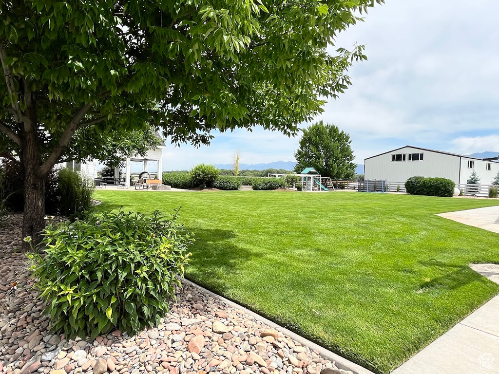 View of yard with a playground