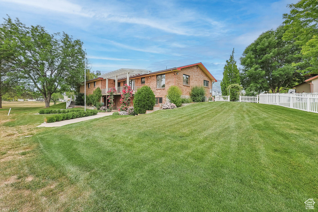 Back of property with brick siding