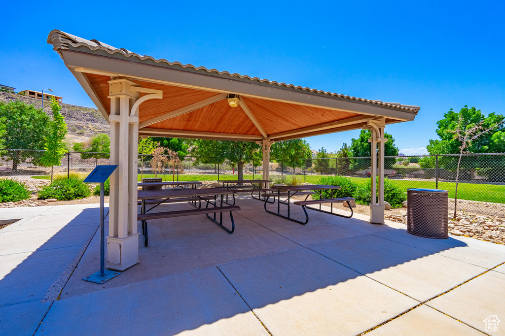 View of property's community with a gazebo and a patio