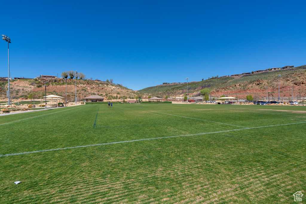 View of community featuring a sport area and a mountain view