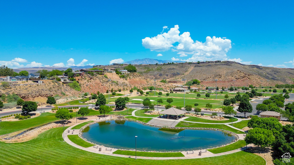 View of home's community with a water and mountain view