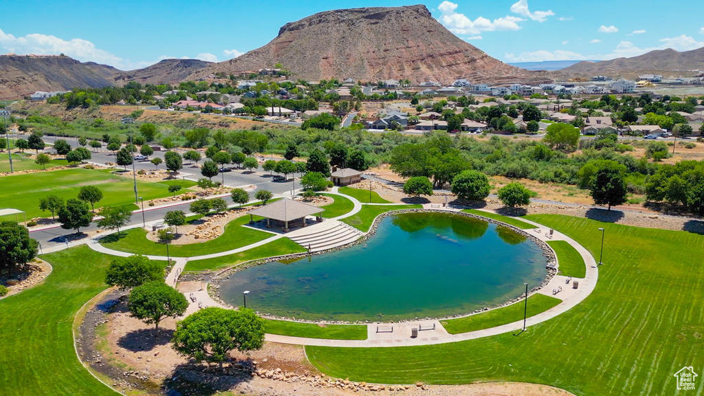 Aerial perspective of suburban area featuring a water and mountain view