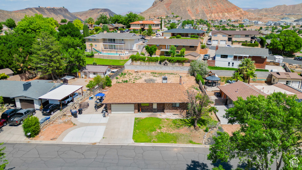 Aerial perspective of suburban area with mountains