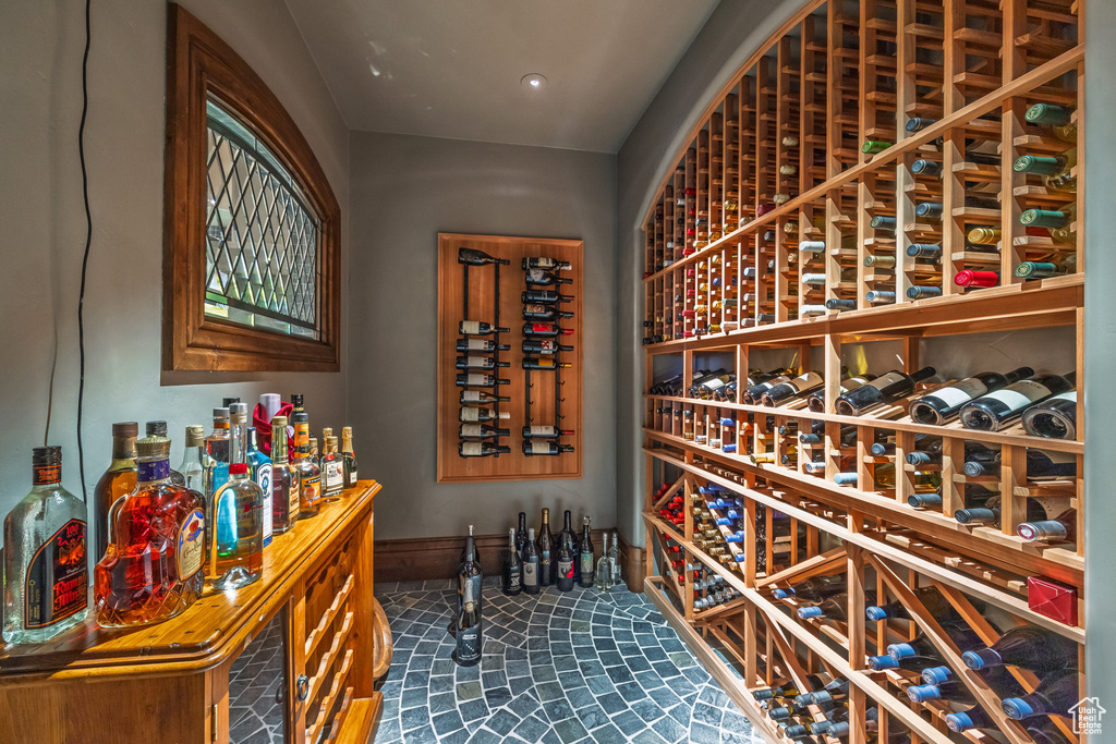 Wine cellar featuring baseboards