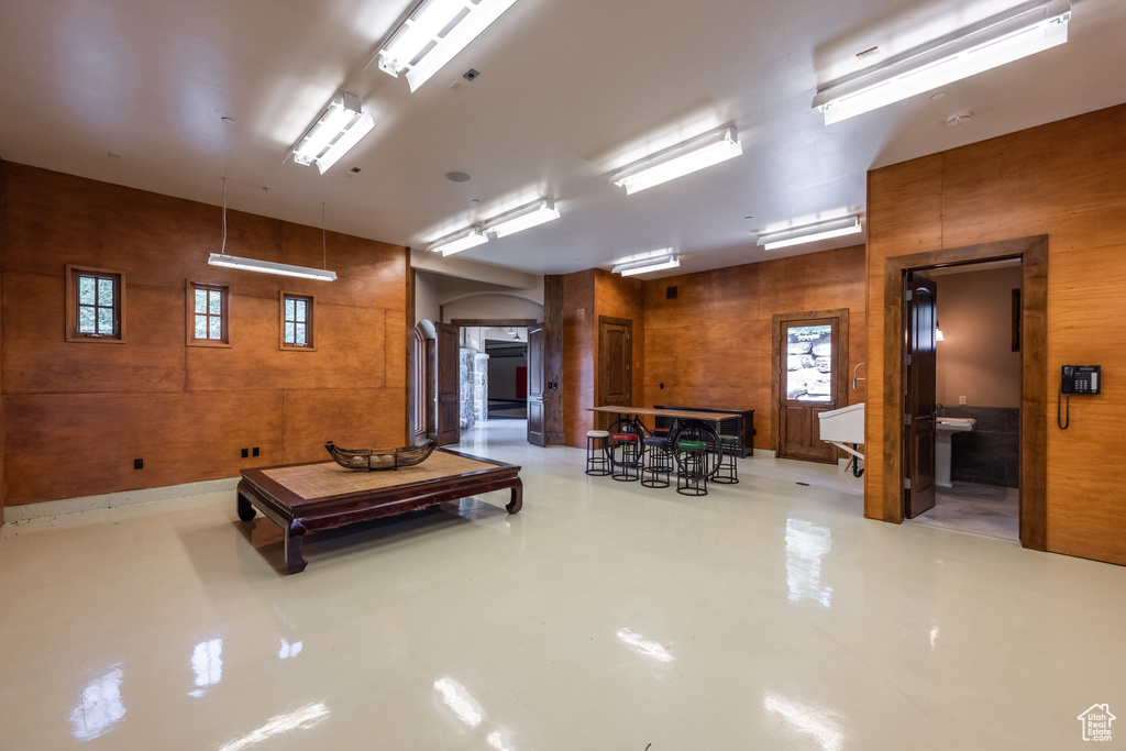 Miscellaneous room featuring finished concrete flooring