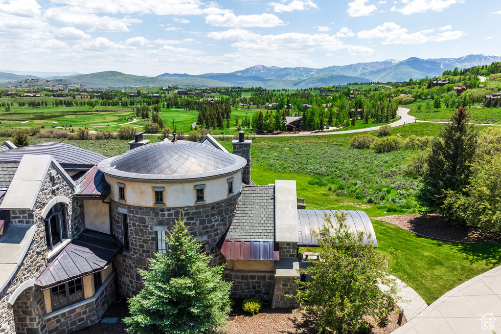 View of subject property with a mountainous background