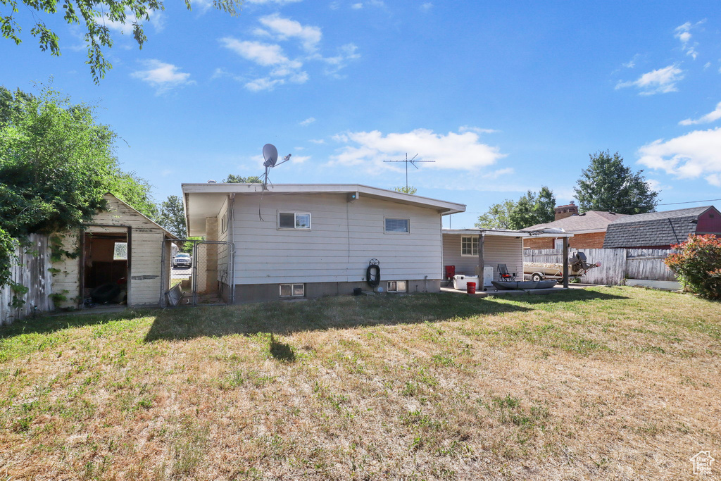 Back of property with a storage unit