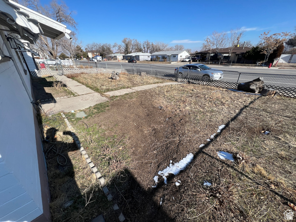 View of yard with a residential view