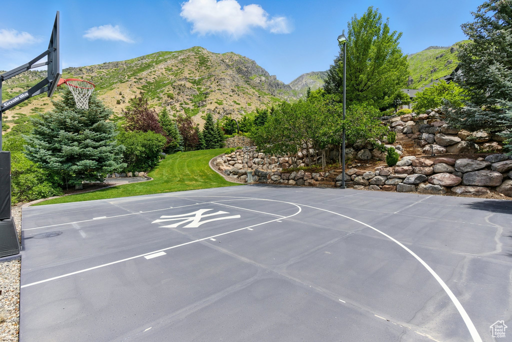 View of sport court featuring a mountain view and community basketball court