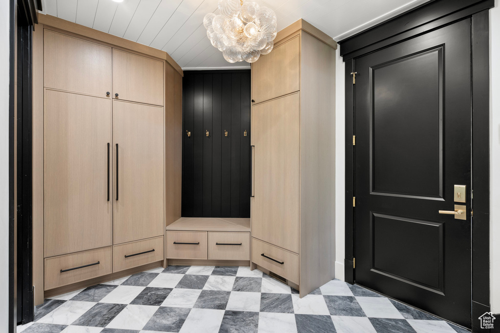 Entryway featuring a chandelier and light flooring