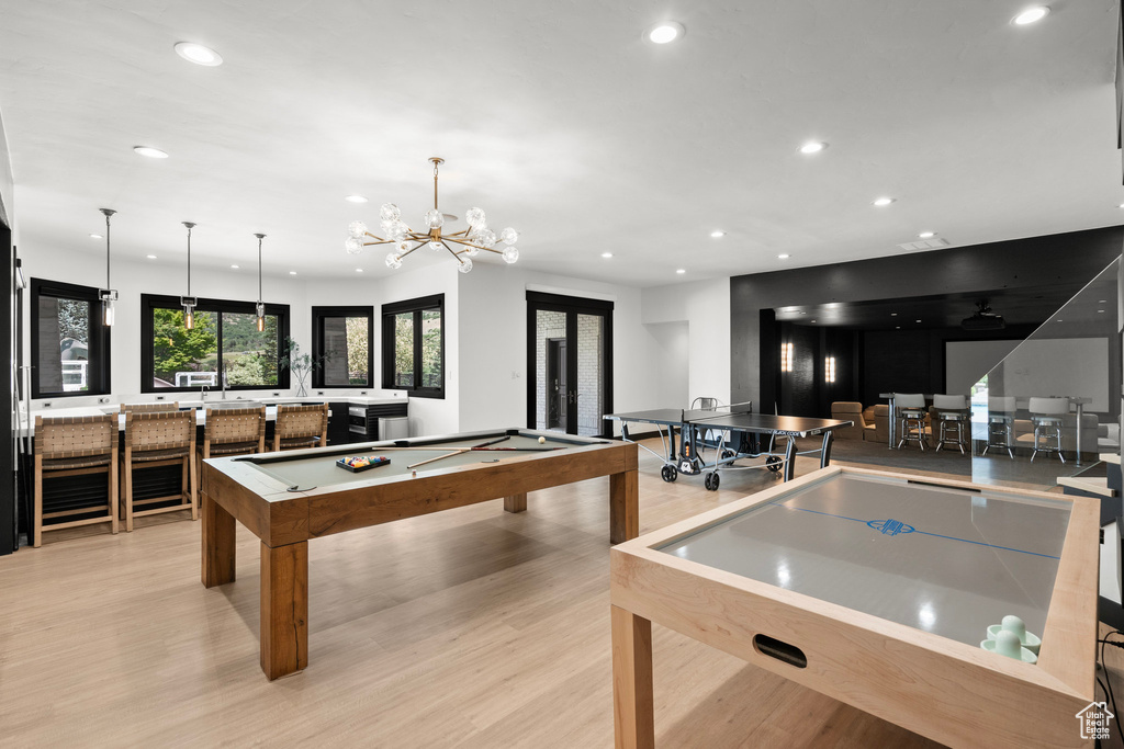 Recreation room with recessed lighting, light wood-type flooring, and billiards table