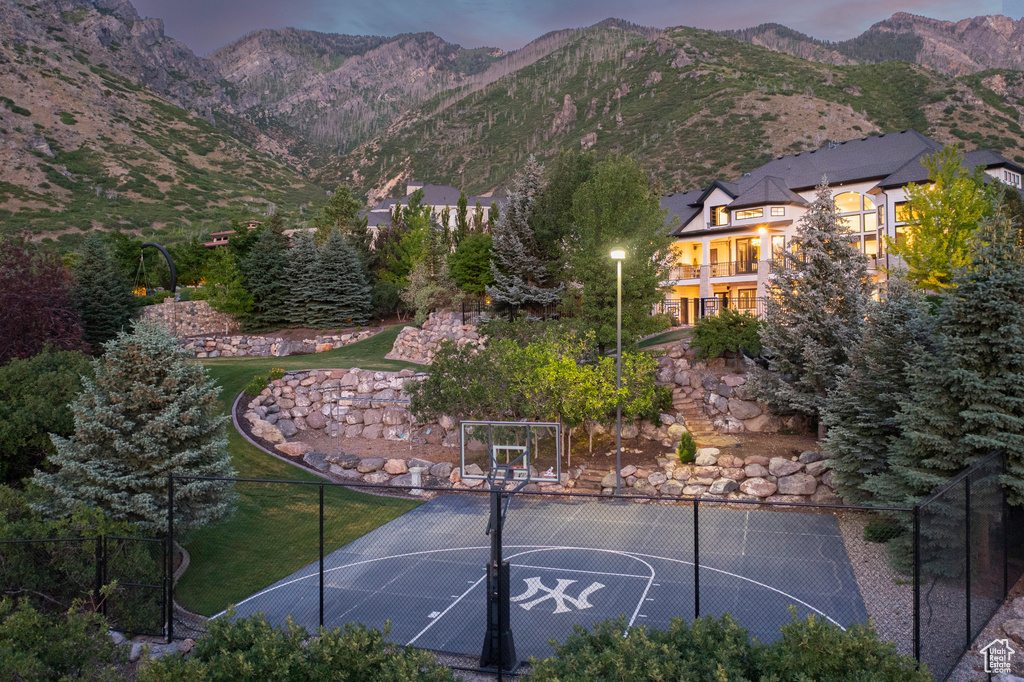 View of sport court with community basketball court and a mountain view