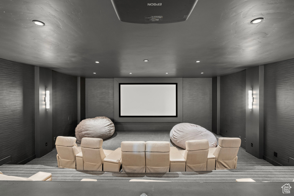 Carpeted cinema with recessed lighting