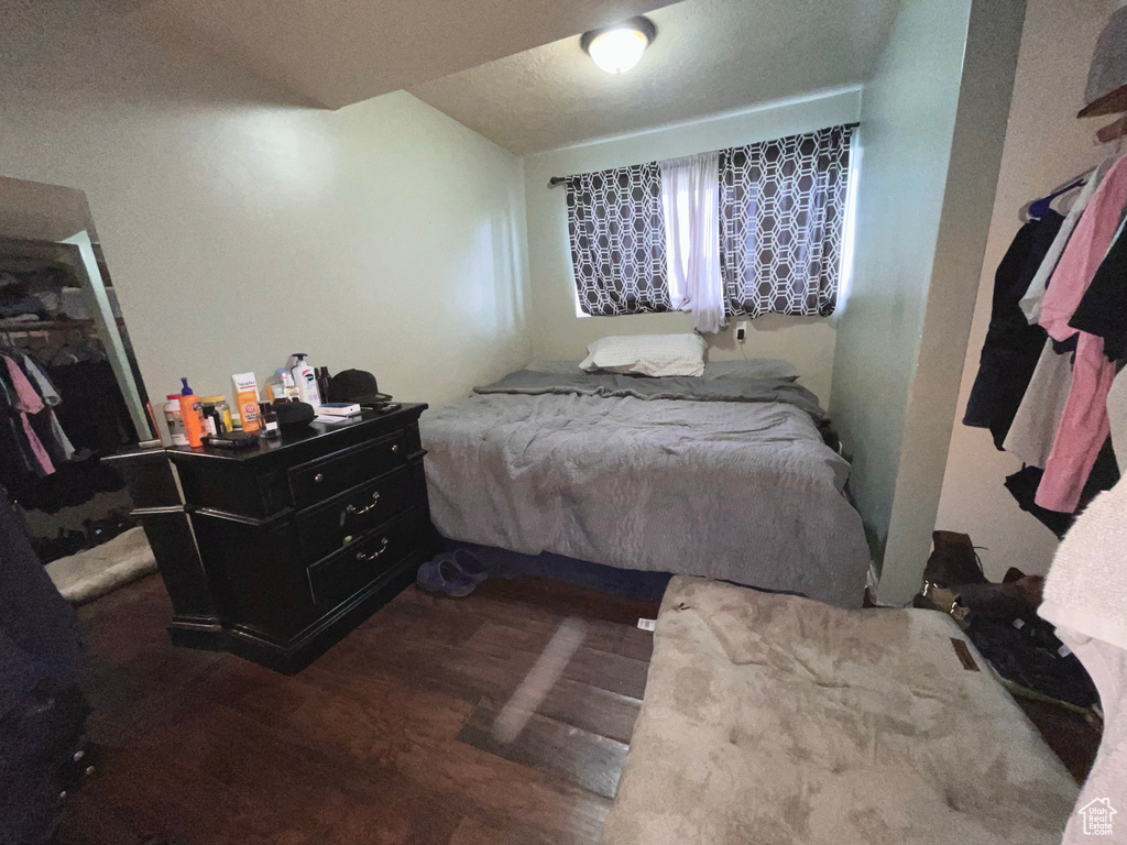 Bedroom featuring wood finished floors