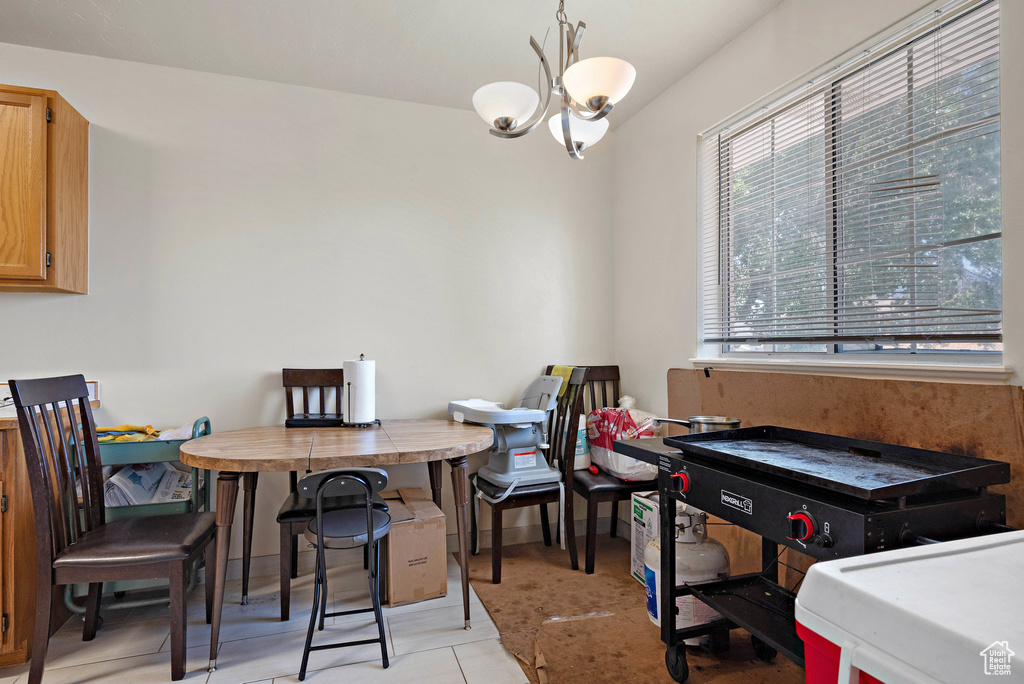 Dining room with a chandelier