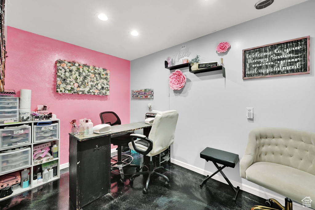 Office space with baseboards and recessed lighting