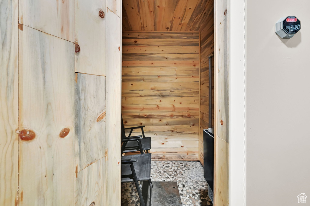 Relaxing sauna with wood ceiling and wooden walls