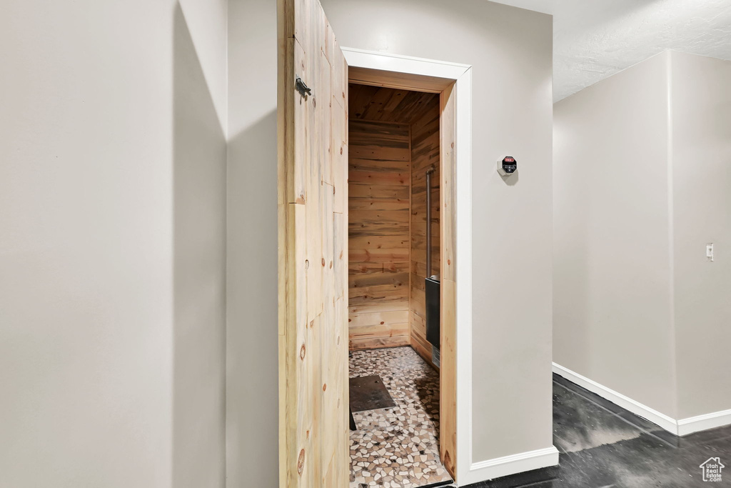 Hall featuring baseboards