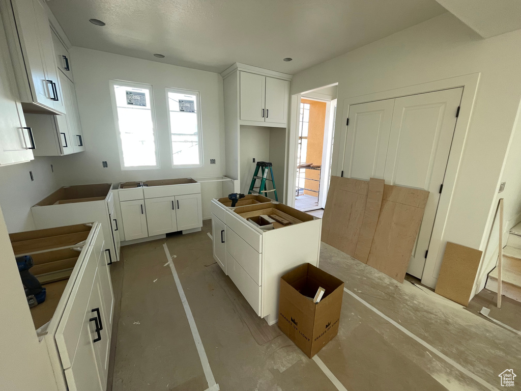 Kitchen with white cabinetry