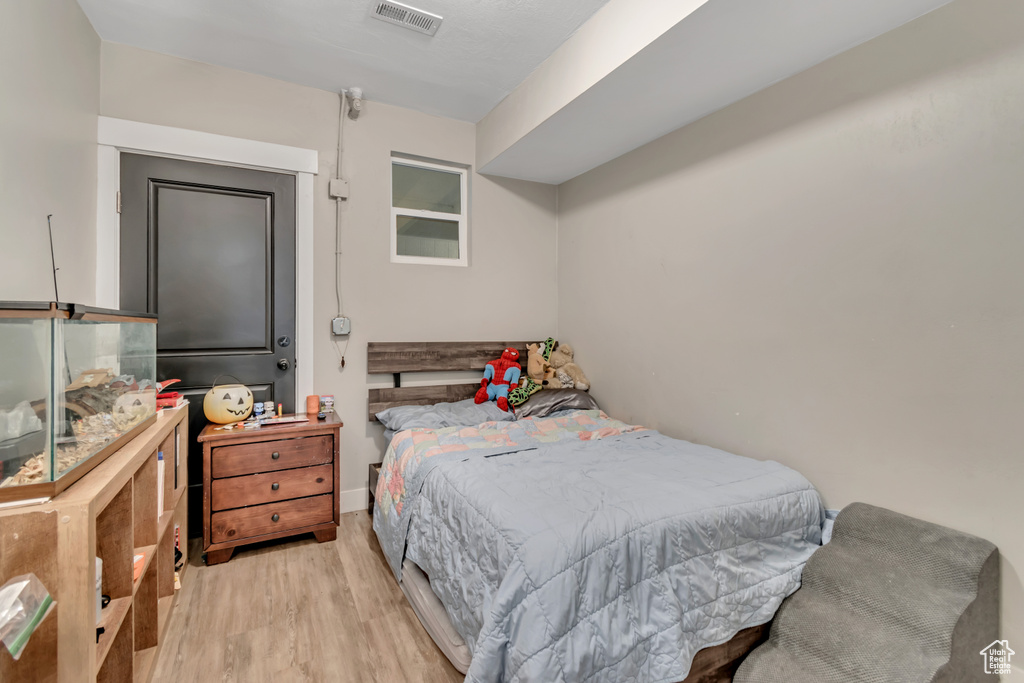 Bedroom featuring wood finished floors
