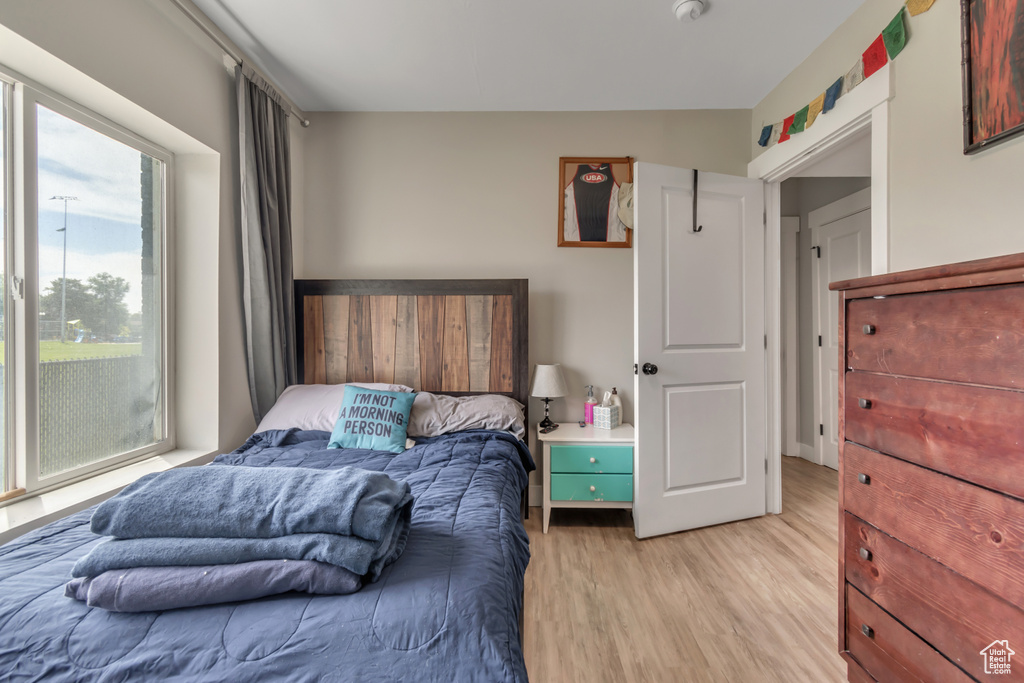 Bedroom with light wood-type flooring