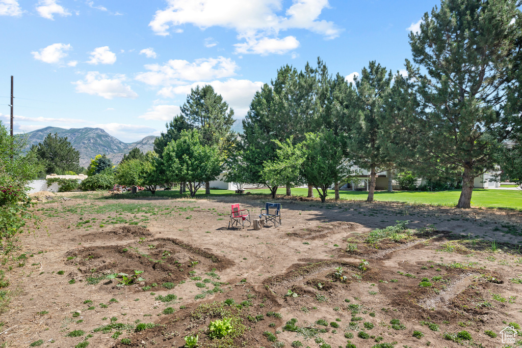 View of yard with a mountain view