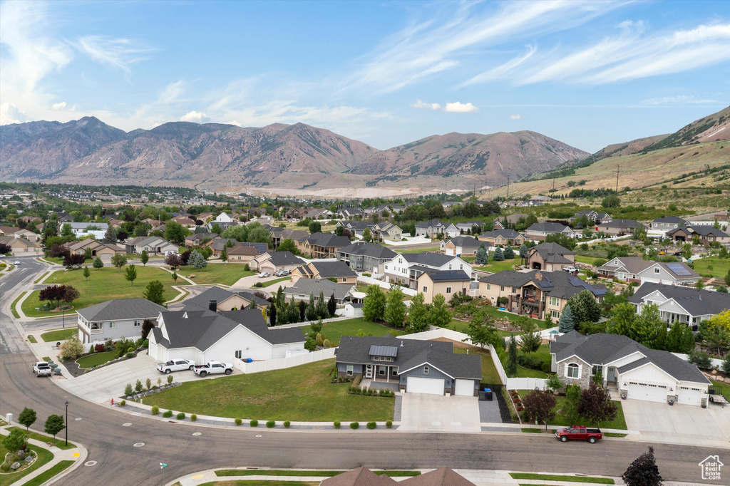 View of property location with nearby suburban area and a mountainous background