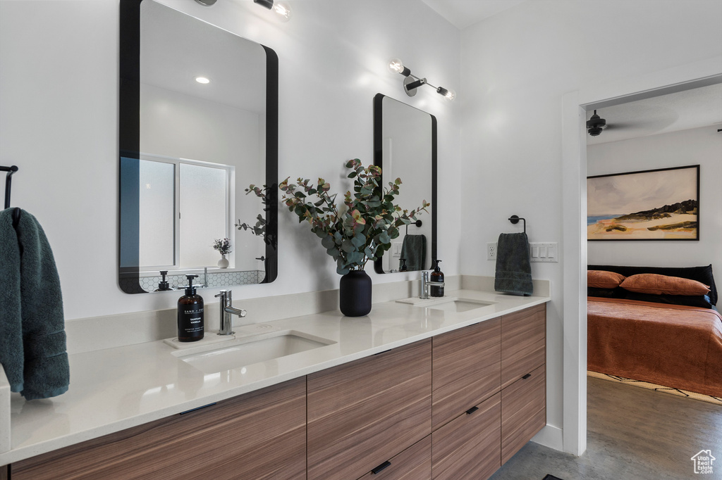 Ensuite bathroom featuring double vanity