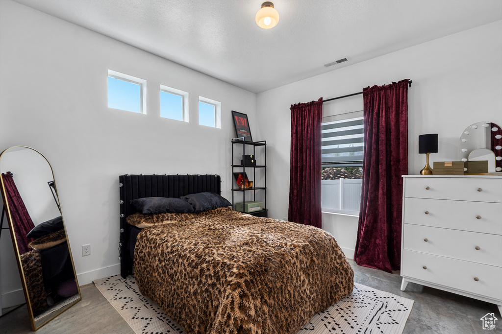Bedroom featuring baseboards