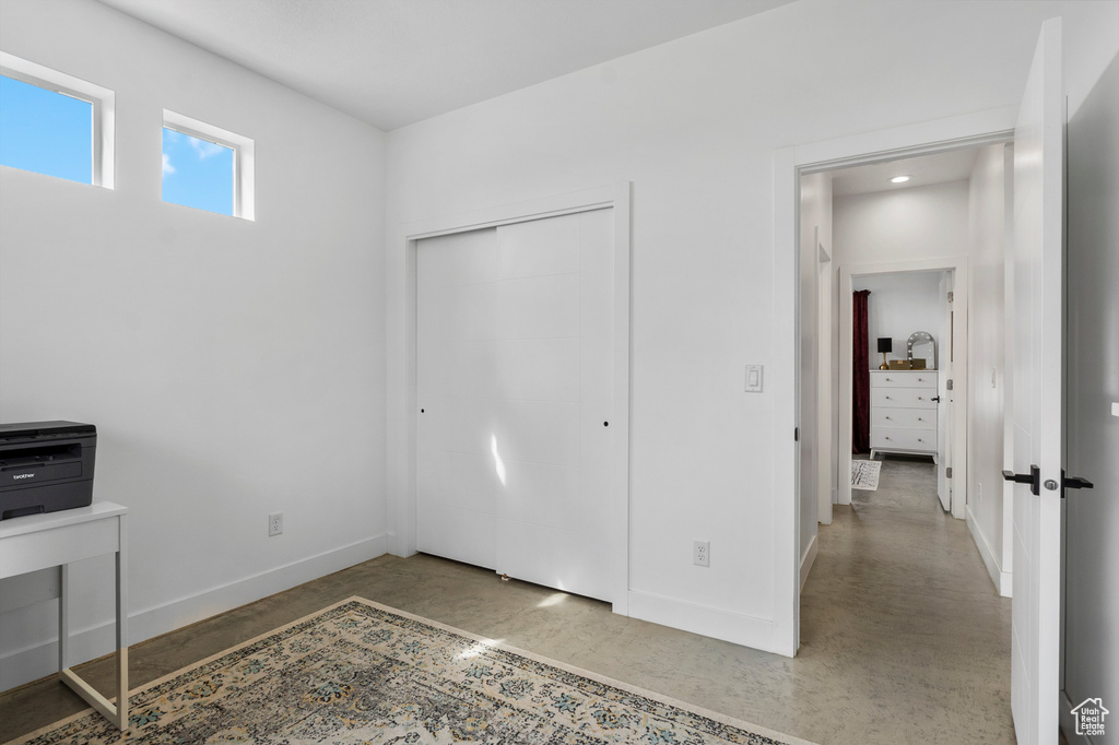 Unfurnished bedroom with a closet and recessed lighting