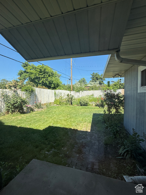 View of fenced backyard