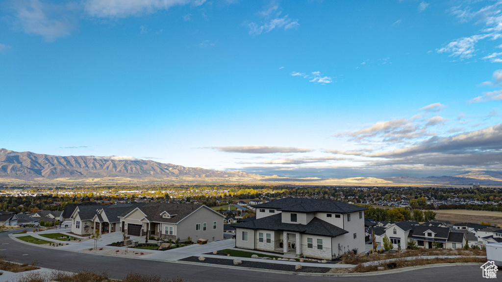View of mountain background featuring nearby suburban area